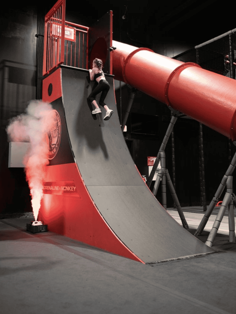 Climbing sports challenge at QuestForDirections indoor adventure park.