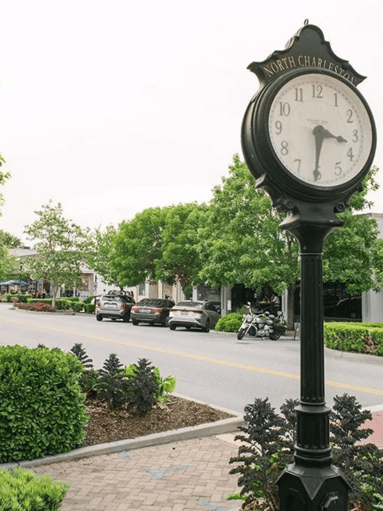 Vintage street clock in North Charleston, charming downtown ambiance, perfect for local SEO.