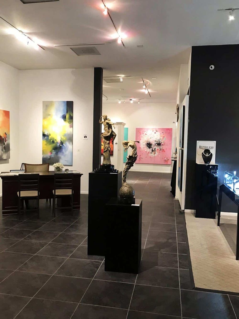 Elegant art gallery showcasing contemporary paintings and sculptures for inspiring interior design.