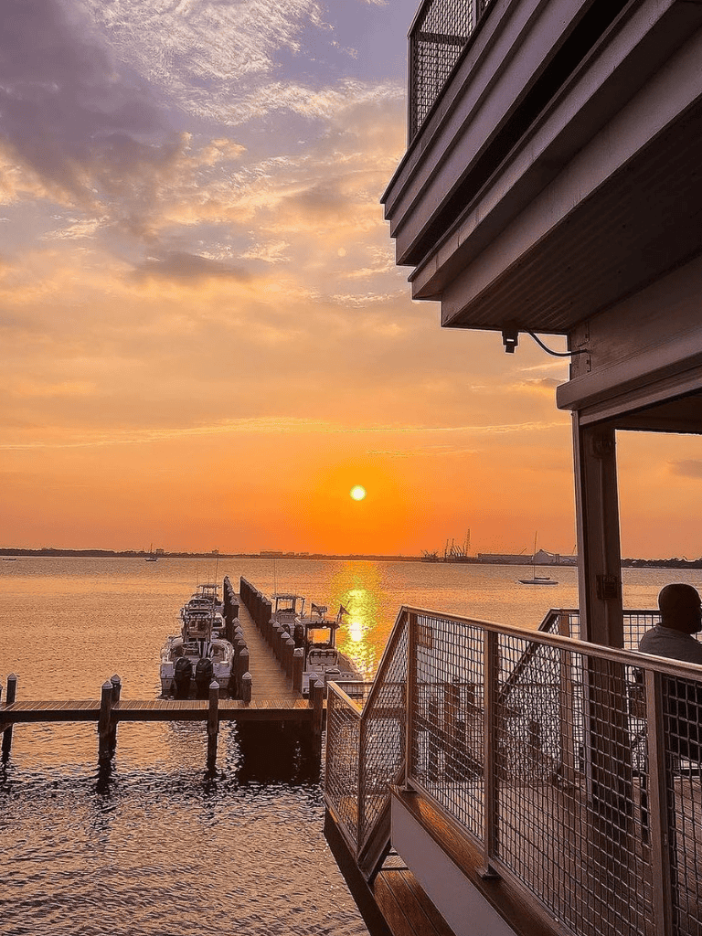 Sunset over marina at Quest for Directions, inspiring navigation and travel experiences.
