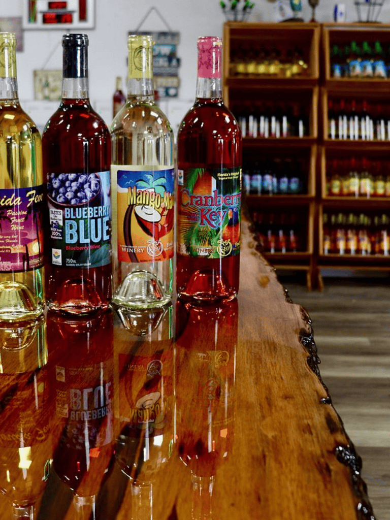Refreshing fruit-flavored wines on display at QuestForDirections, with vibrant labels and colorful branding.