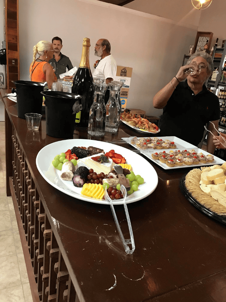 Elegant cheese and fruit platter at a wine tasting event for QuestForDirections celebration.