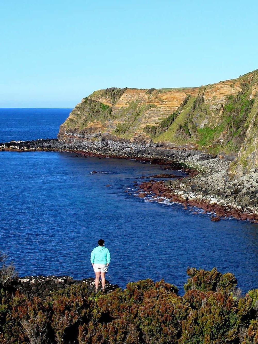 Vast coastal cliffs overlooking the ocean at QuestForDirections scenic destination.