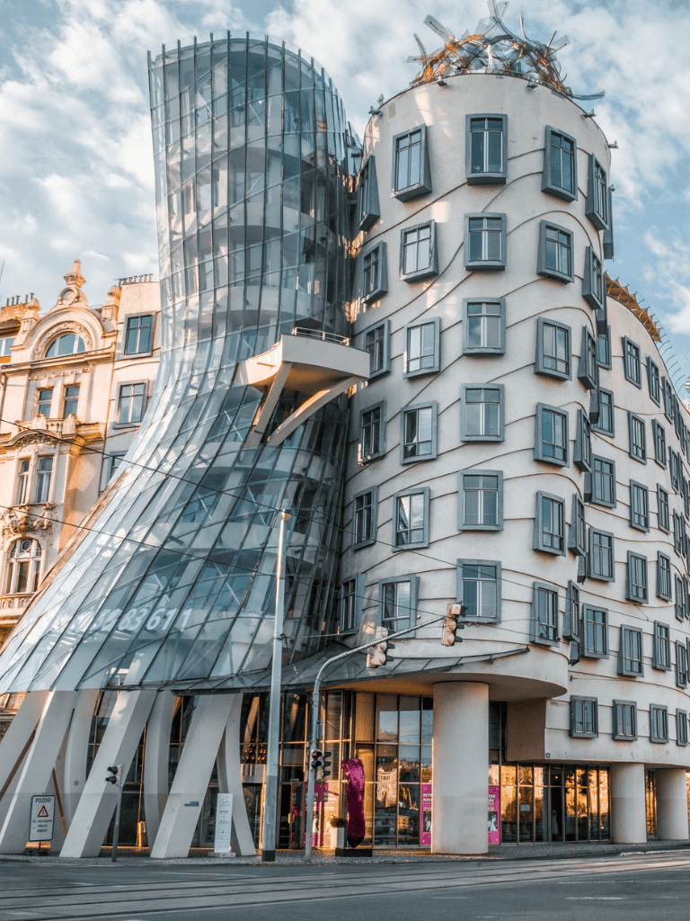 Futuristic architectural building in Barcelona, featuring glass and curved design elements.