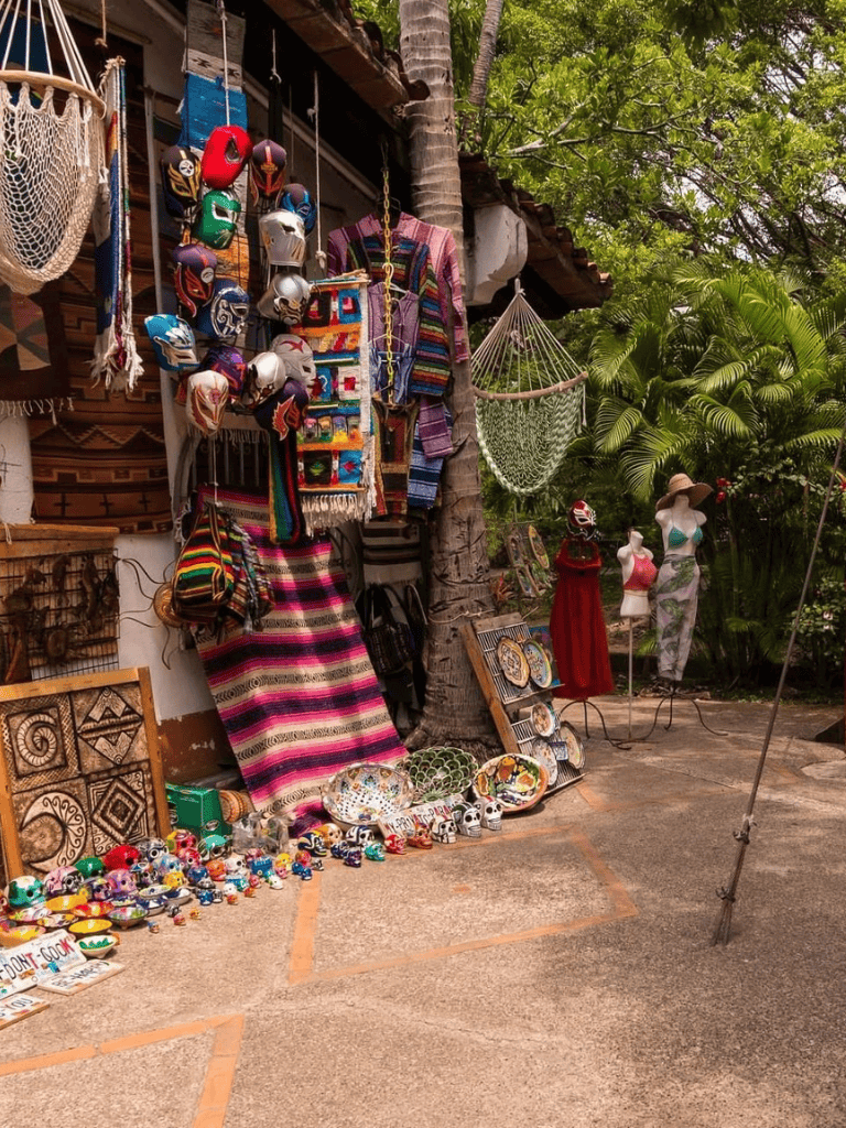Colorful Mexican handicrafts and souvenirs at an outdoor market, perfect for travel and cultural exploration.