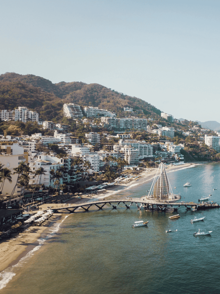 Modern coastal cityscape of Puerto Vallarta with scenic beaches and luxury accommodations.
