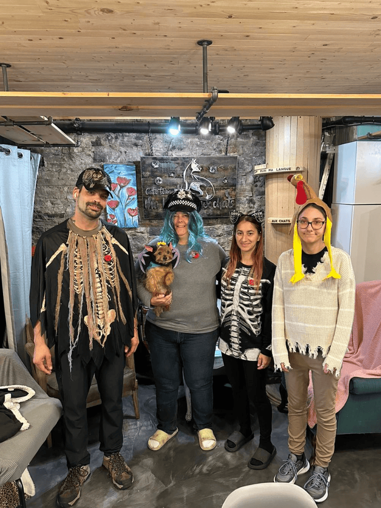 Costumed group at QuestForDirections team-building event, working together for navigation solutions.