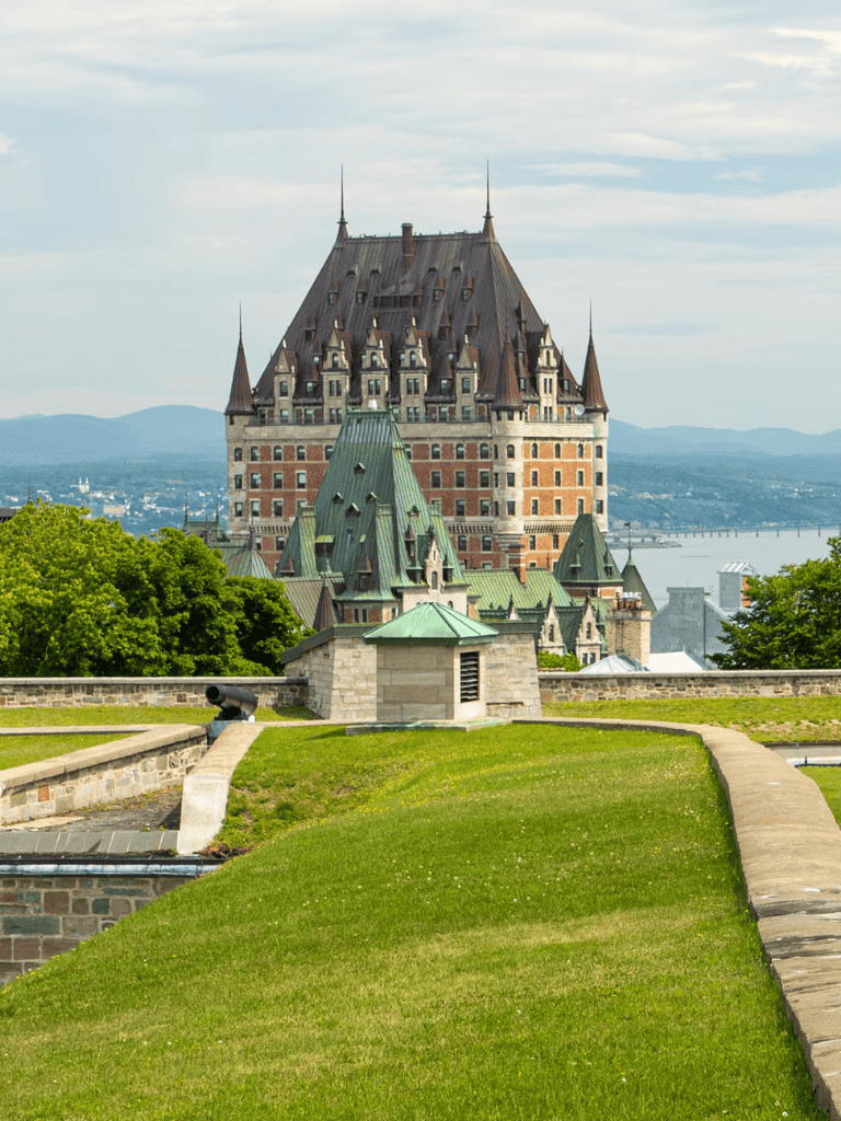 Fairy tale castle with scenic river view in the background, popular tourist destination in Quebec City, Canada.