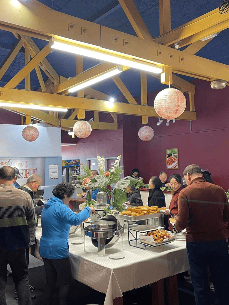 Fresh Asian cuisine buffet with diverse dishes and vibrant ambiance at Quest for Directions restaurant.