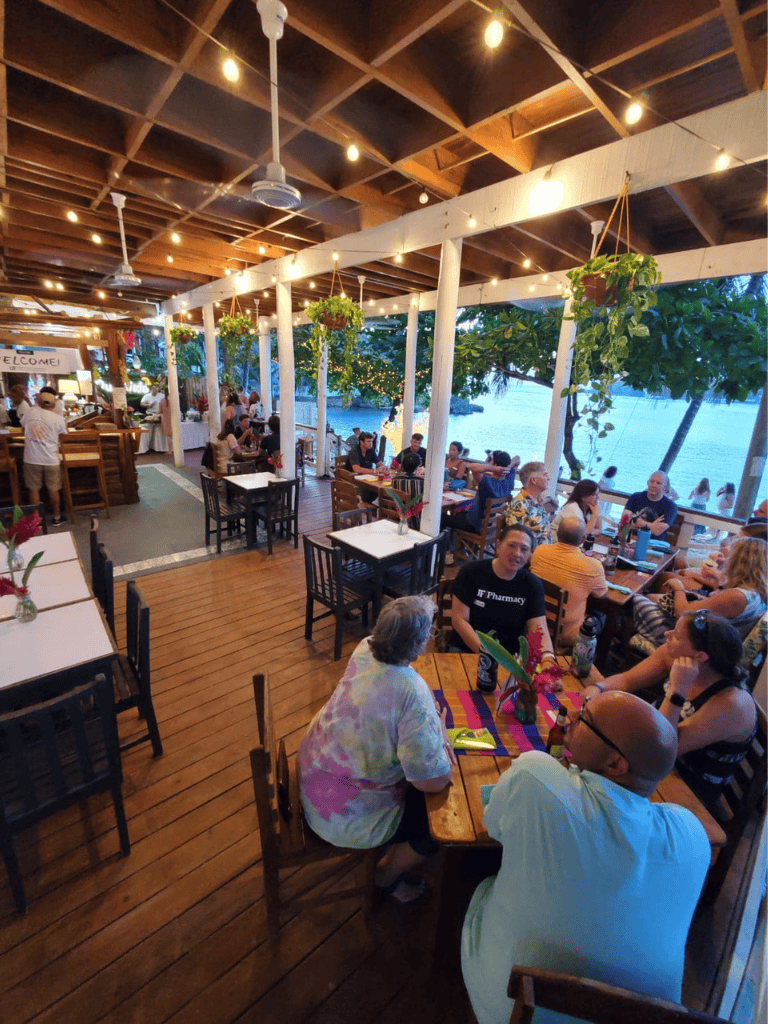 Relaxed waterfront dining with tropical ambiance and ocean views at QuestForDirections restaurant.