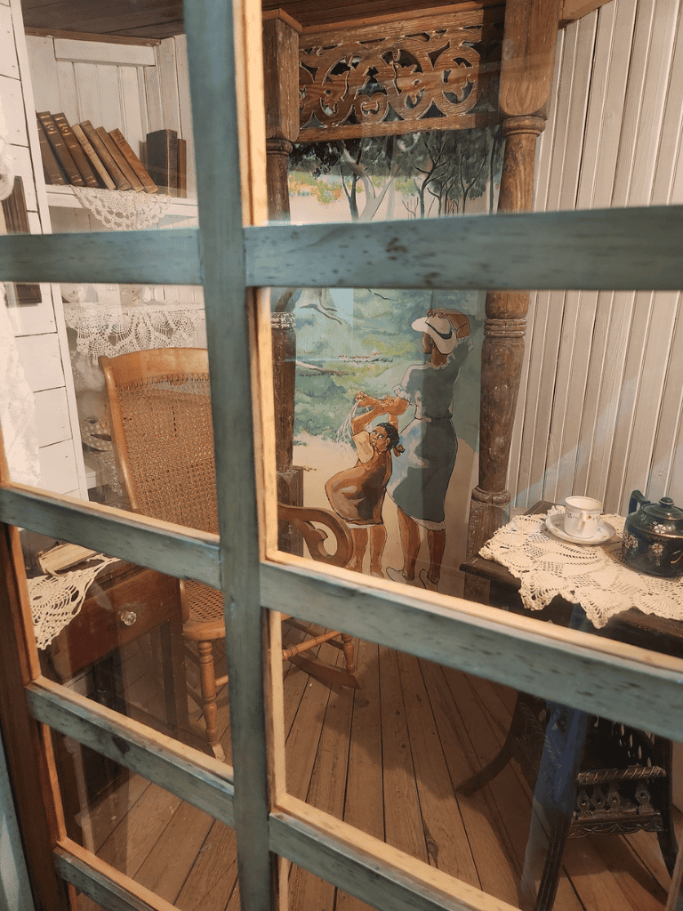 Vintage cozy interior with antique furniture and nostalgic artwork at QuestForDirections.