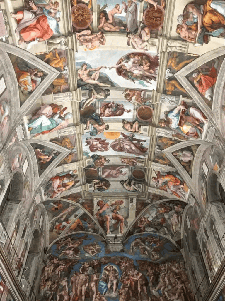 The Sistine Chapel ceiling, painted by Michelangelo, depicting biblical scenes and divine artistry.