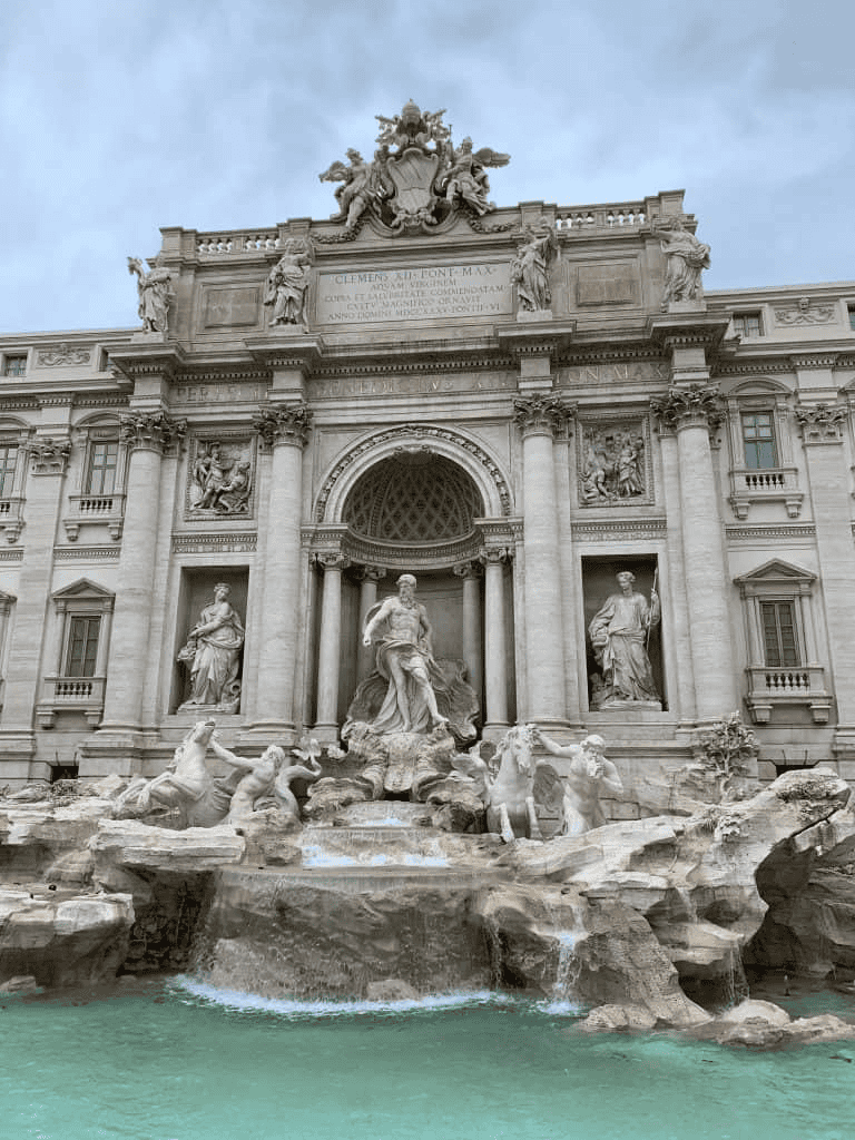 Magnificent Trevi Fountain in Rome showcasing elaborate sculptures and classical architecture.