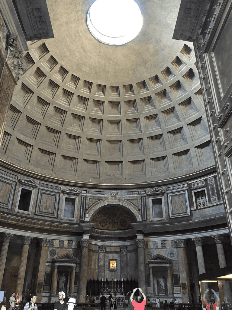 Majestic Roman Pantheon interior with grand dome and oculus, awe-inspiring history and architecture.