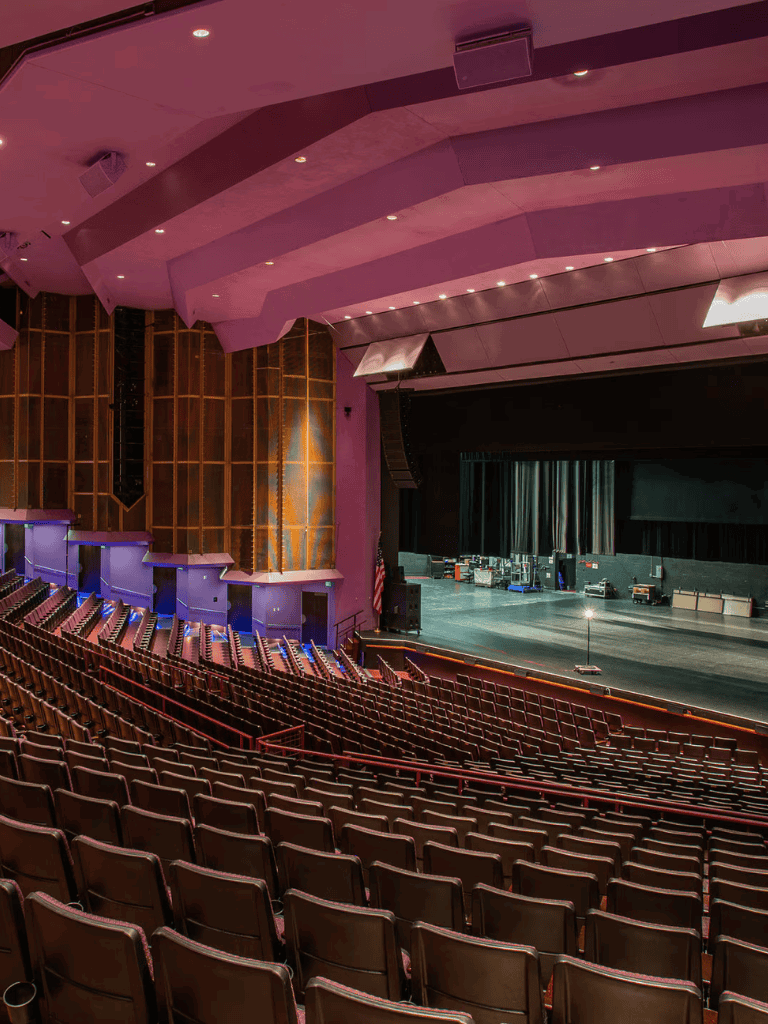 Auditorium stage with seating for performances and events - QuestForDirections venue images.