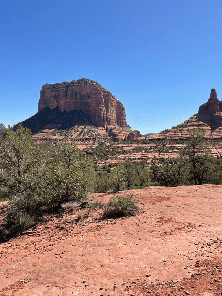 Stunning desert landscape with iconic red rock formations and clear blue sky.