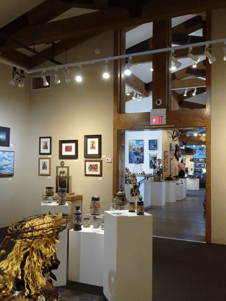 Colorful art gallery showcasing handcrafted items and paintings at QuestForDirections.
