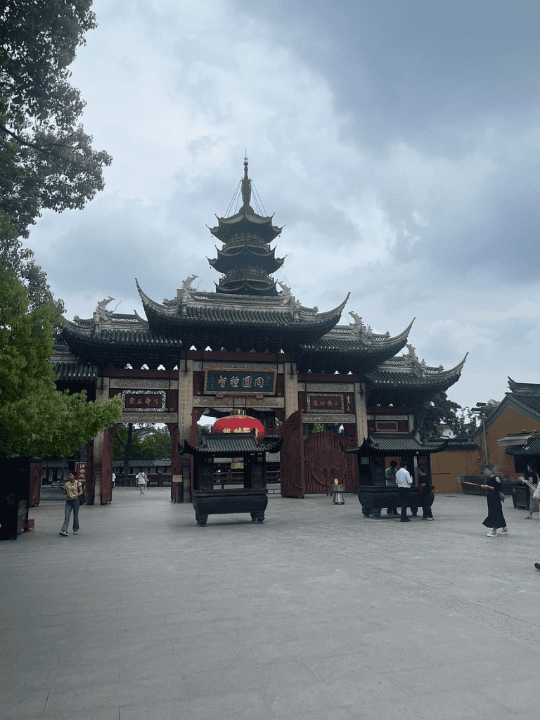 Intricate traditional Asian pagoda at a historic temple, cultural site, travel destination, architecture, sightseeing.