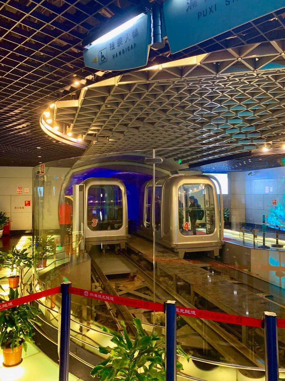 Modern airport train transportation at Hong Kong International Airport.