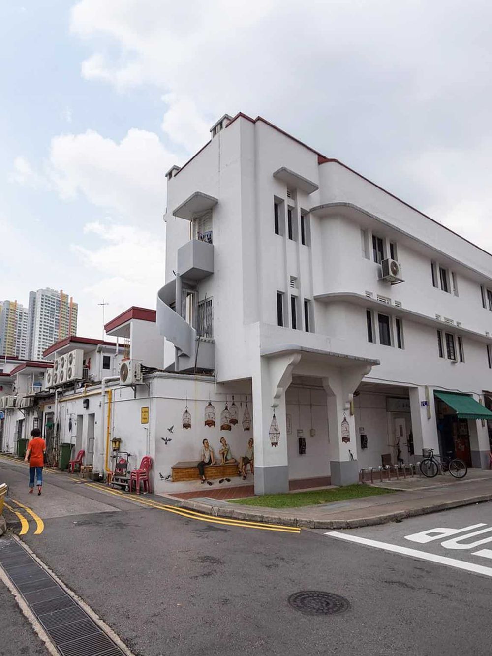Colorful building exterior with street art and urban setting near downtown.