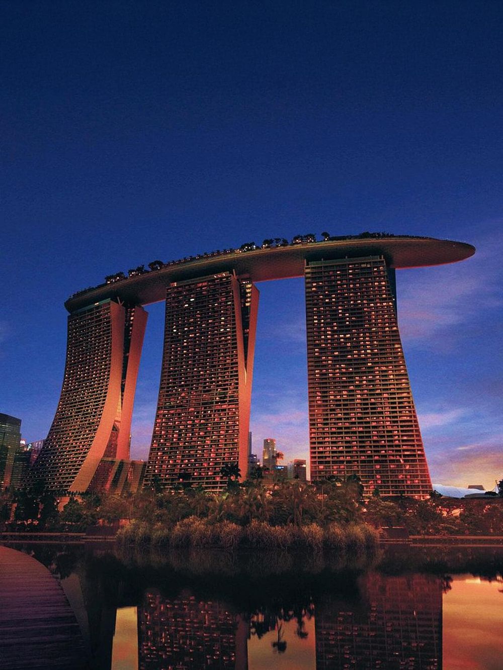 Iconic Marina Bay Sands hotel in Singapore at dusk, a top destination for architecture and travel enthusiasts.