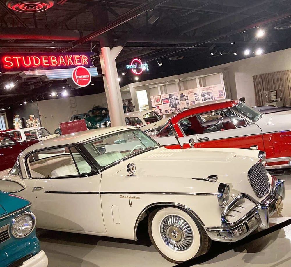 1. Classic vintage Studebaker car display at auto museum.
