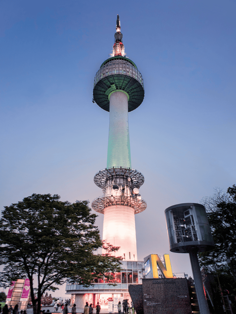 Tall Seoul N-Tower with city views at dusk, popular destination for visitors.