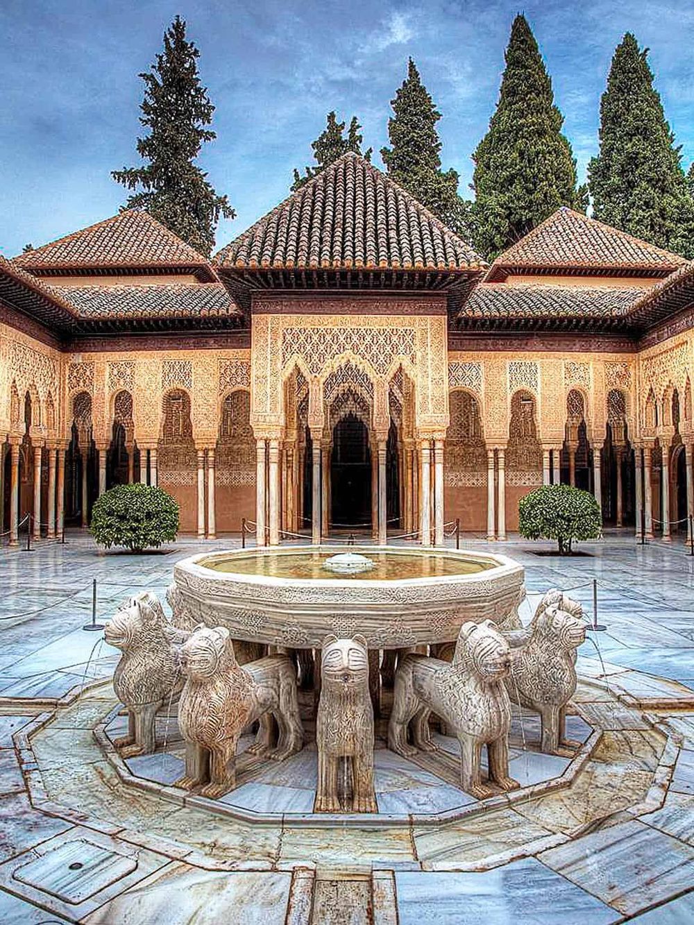 Intricate Islamic architecture at the Palace of the Lions in the Alhambra, Granada, Spain.