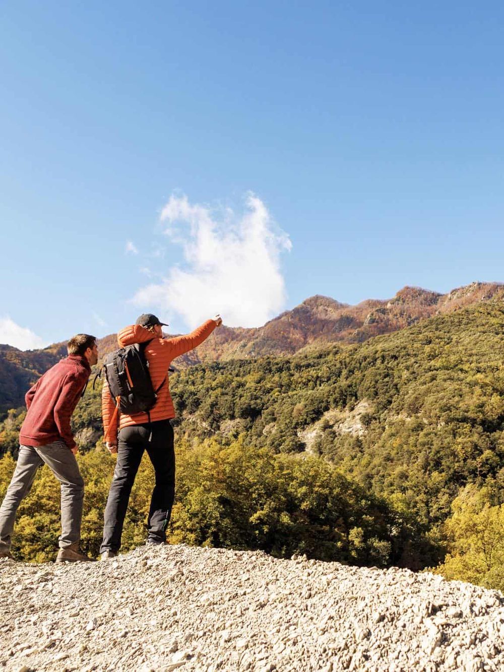 Hiking adventure in scenic mountains with hikers exploring nature trails.