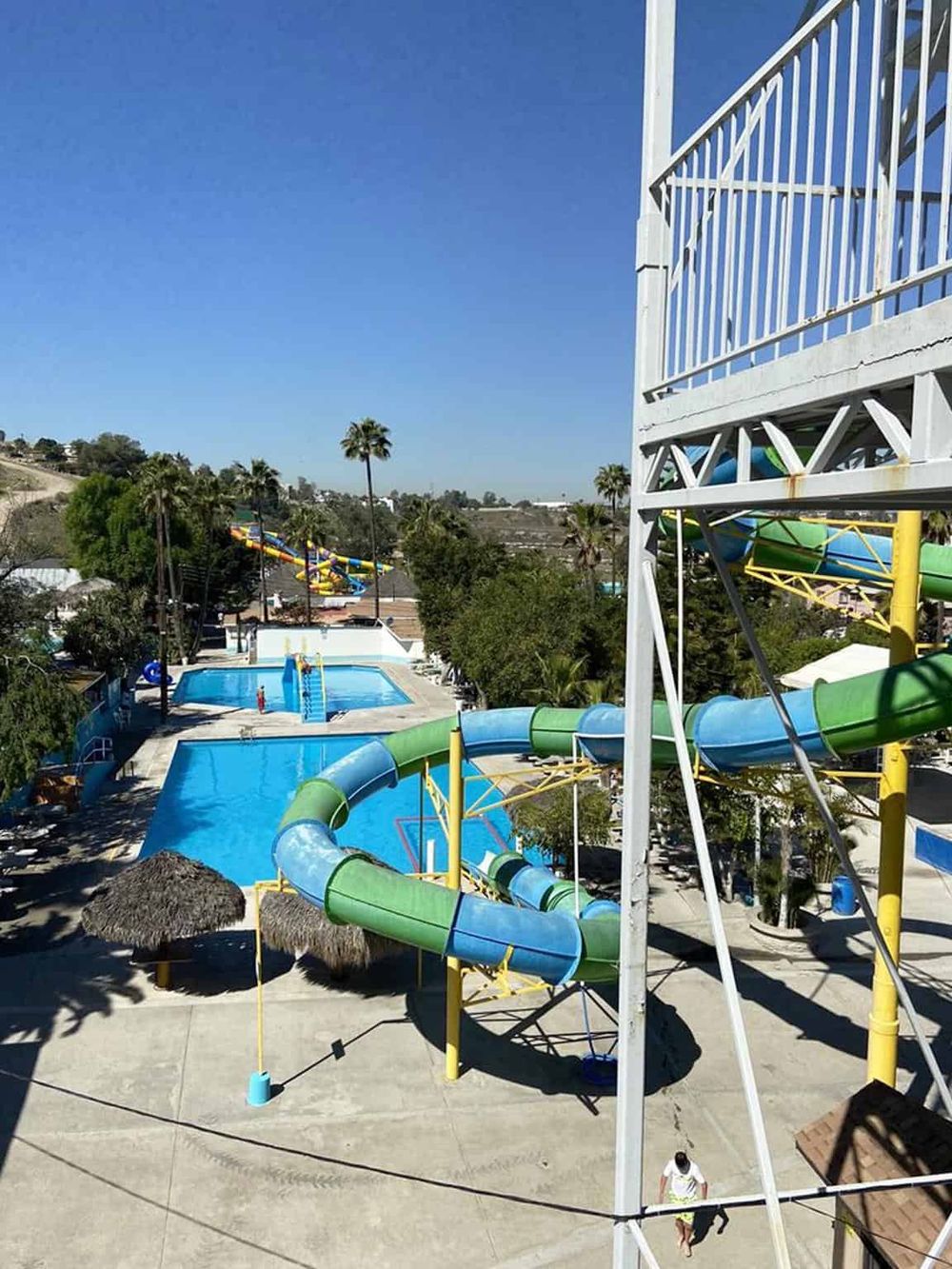 Bright water park with colorful slides, pools, and fun attractions at QuestForDirections.