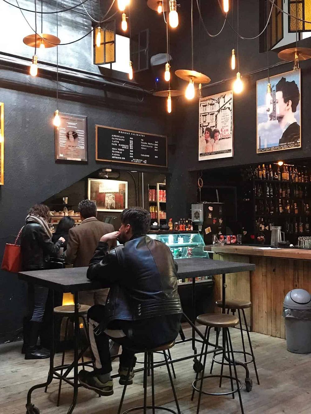 Chill cozy bar interior with pendant lighting and modern decor for nightlife and social drinks.