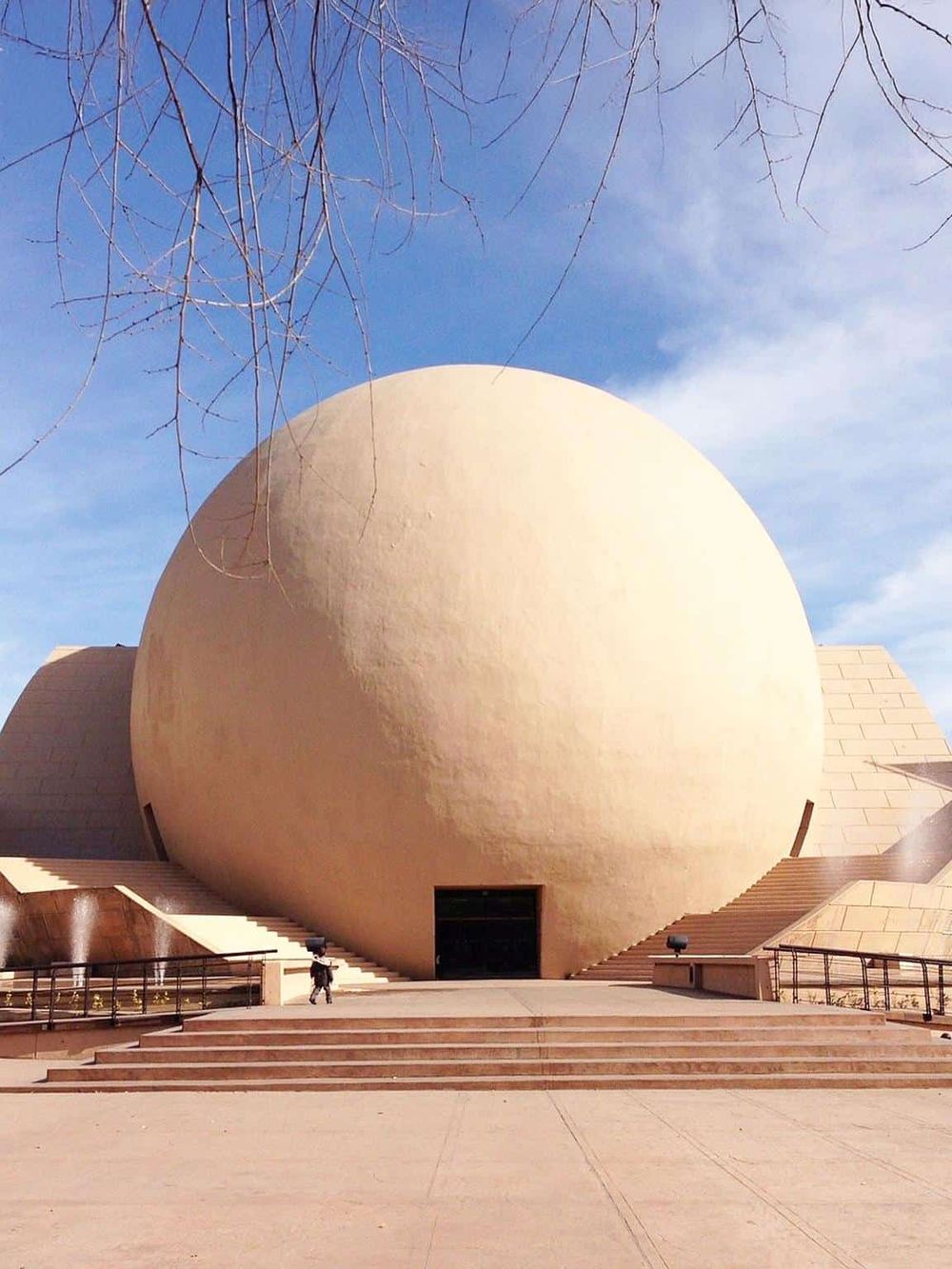 Modern spherical museum architecture at Quest for Directions site.