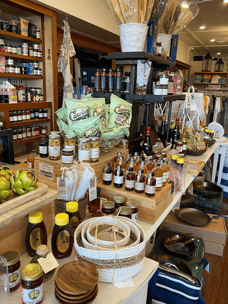 Pure natural honey bottles and artisanal products on display at local shop, promoting healthy and organic lifestyle.