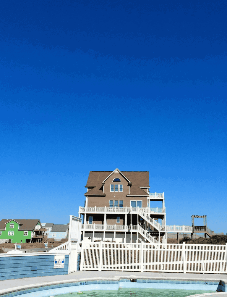 Bright beach house with decks and pool, coastal vacation rental, oceanfront getaway, QuestForDirections.
