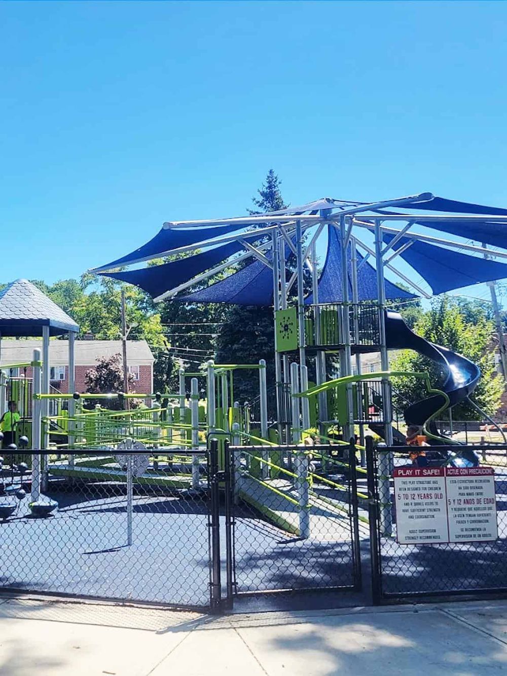 Vibrant kids' playground with slides, tunnels, and safety features at QuestForDirections. Perfect for children's outdoor fun and adventure.