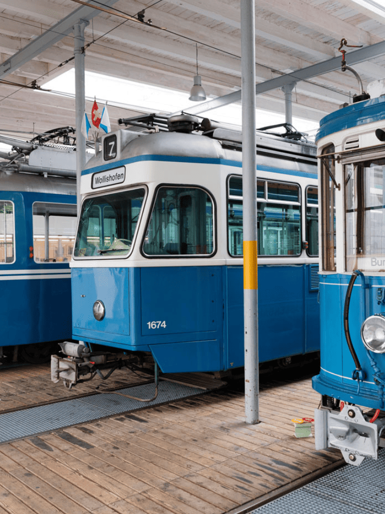 Wollishofen vintage tram in museum, historic urban transportation, classic trolley car exhibit.