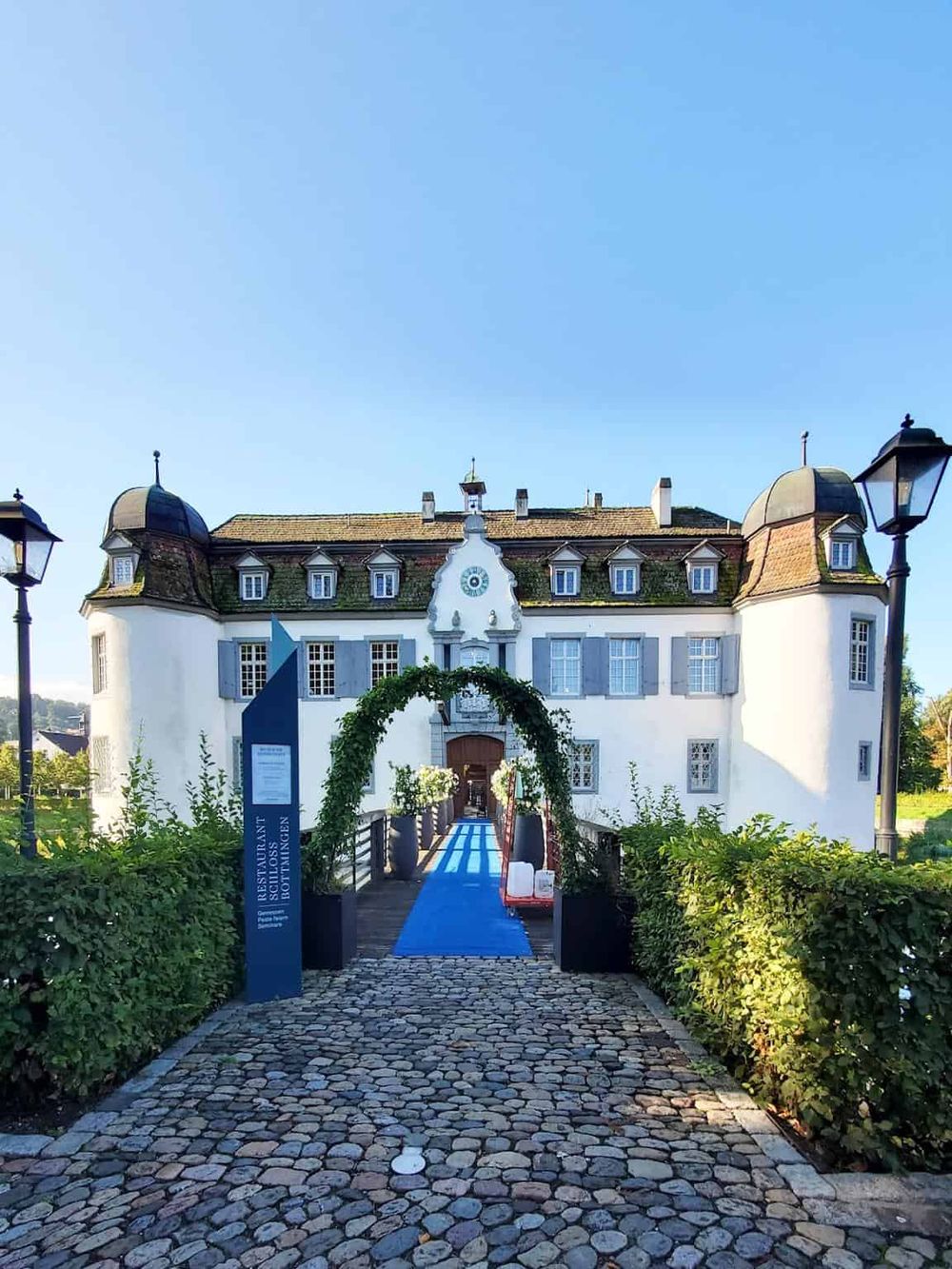 Cultural heritage site with a historic building and cobblestone pathway during daytime.