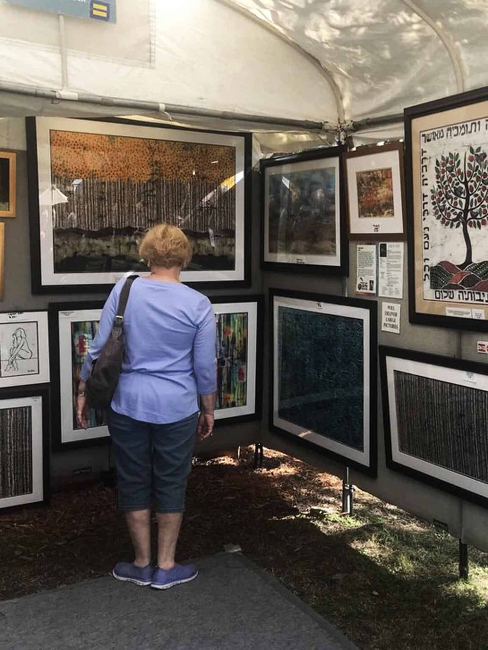 Colorful art exhibition showcasing paintings and artwork at QuestForDirections.