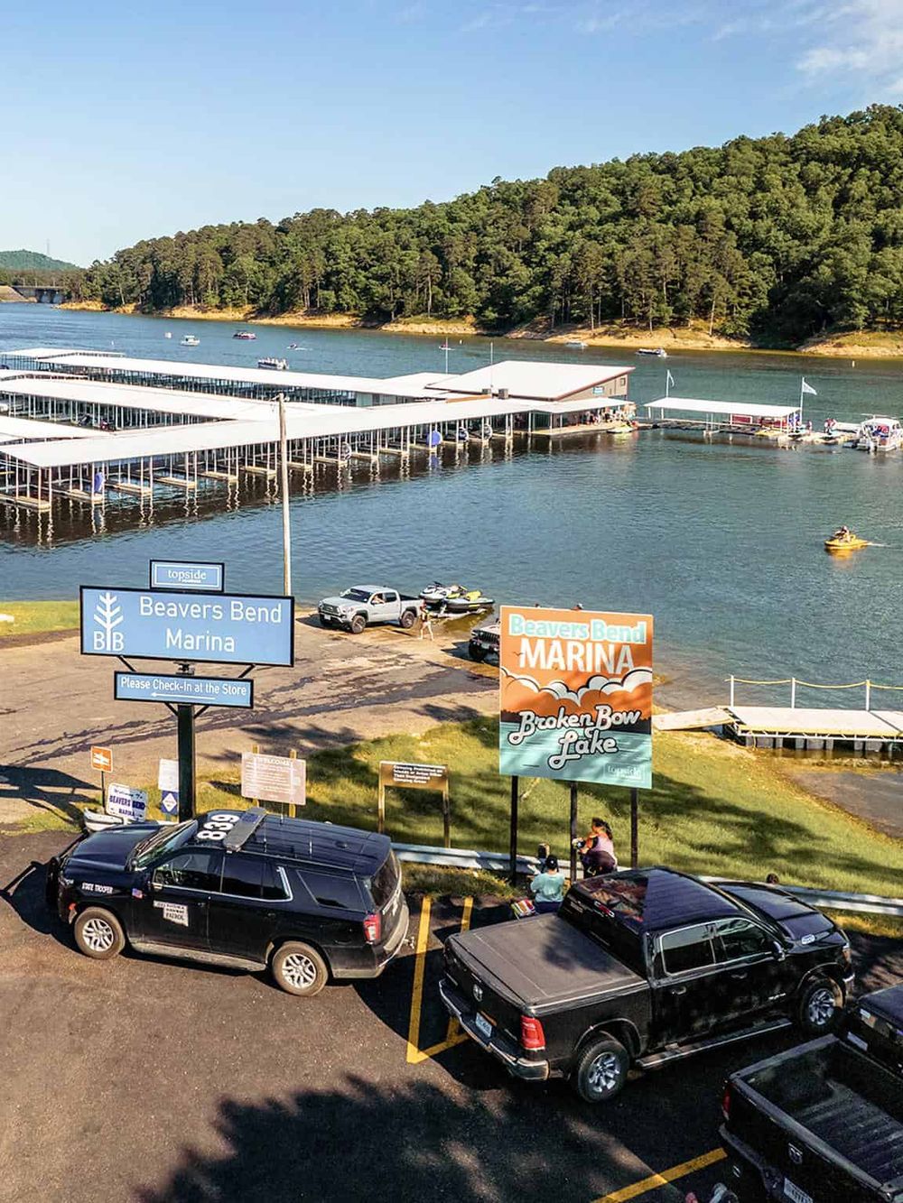 Serene Beavers Bend Marina at Broken Bow Lake, offering boating, fishing, and scenic views in Oklahoma.