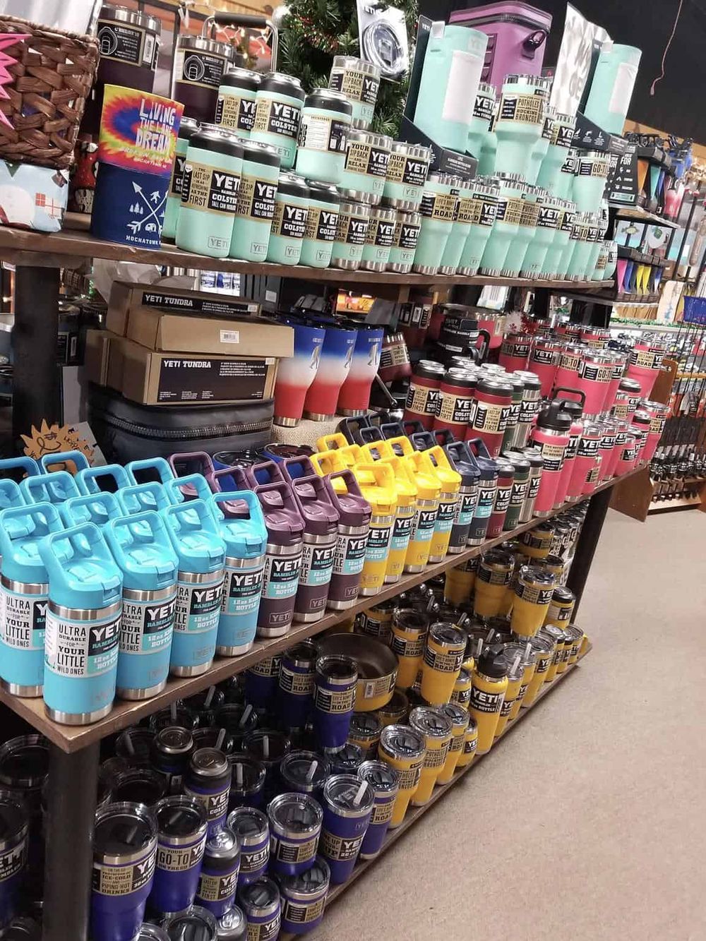 1. YETI insulated drinkware and accessories display at QuestForDirections store in the outdoors section.