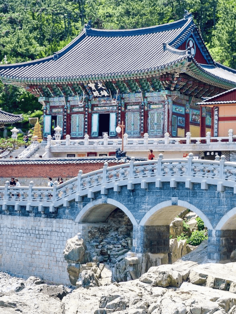Traditional Korean temple with ornate architecture and scenic surroundings.