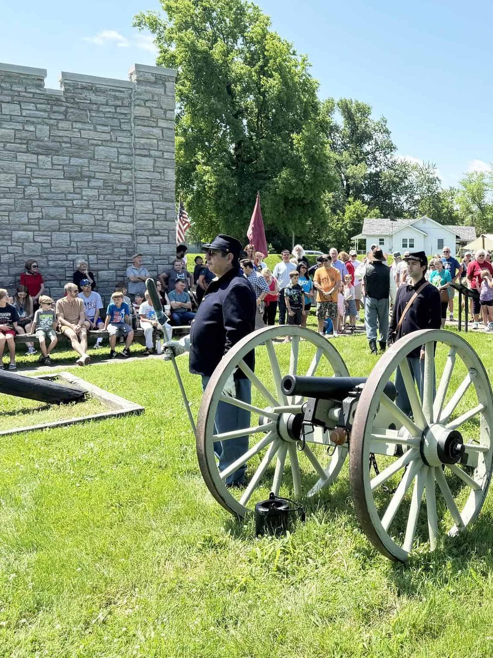 Historic cannon displayed during outdoor event at QuestForDirections site for Civil War reenactment and educational tours.