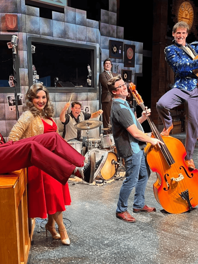 Energetic band performing live music, passionate jazz vocals, vibrant stage setting, musical entertainment.