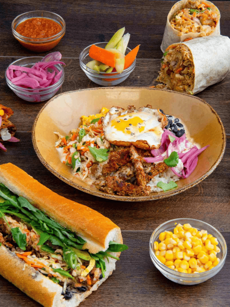 Fresh Mexican platter with burritos, rice, vegetables, and flavorful sides at QuestForDirections.