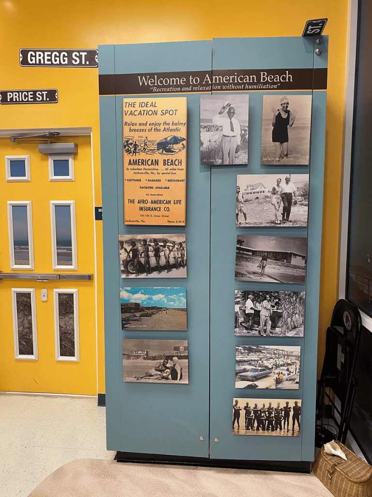 Relaxing beach decor at American Beach, Jacksonville Florida, featuring vintage photos and scenic beach views.