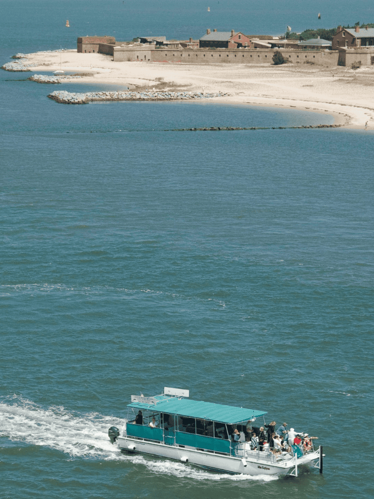 Boat tour exploring coastal harbor and historic fortress at QuestForDirections.