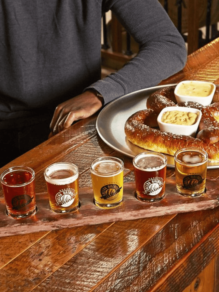 1. Assorted beer flight with pretzel and beer cheese at a local brewery.