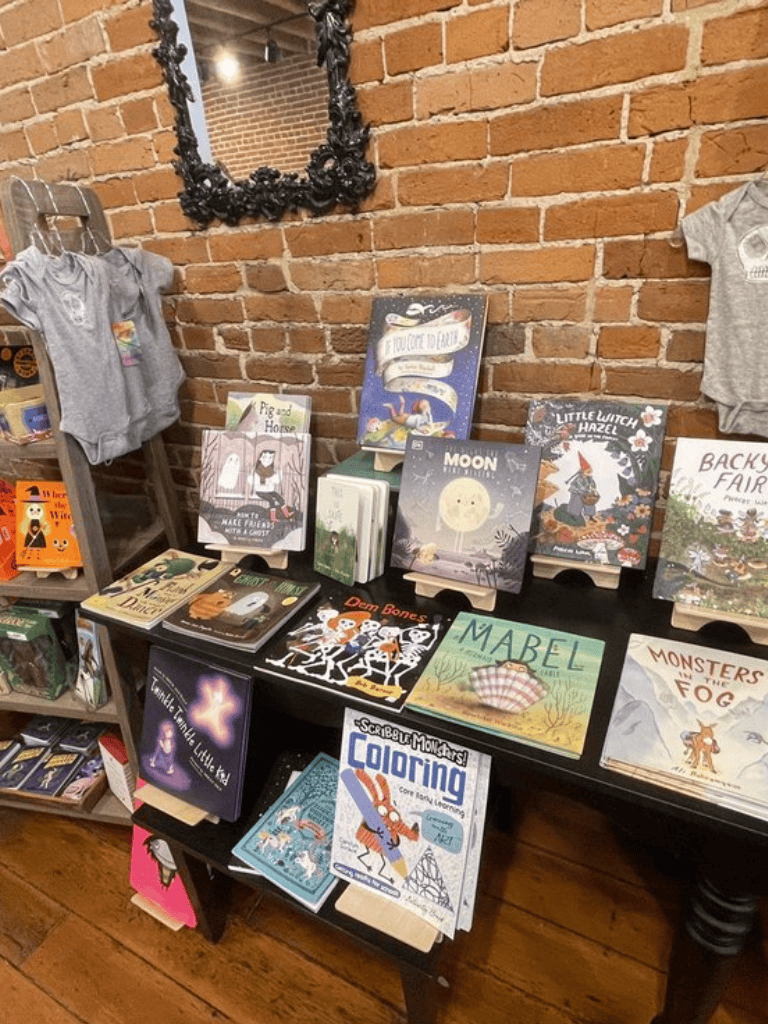 Colorful children's books and toys display at QuestForDirections; perfect for kids' early education and storytelling.