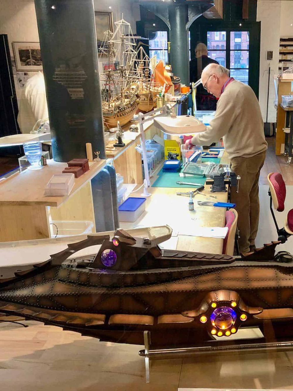 Detailed model ship construction on display at QuestForDirections exhibit.