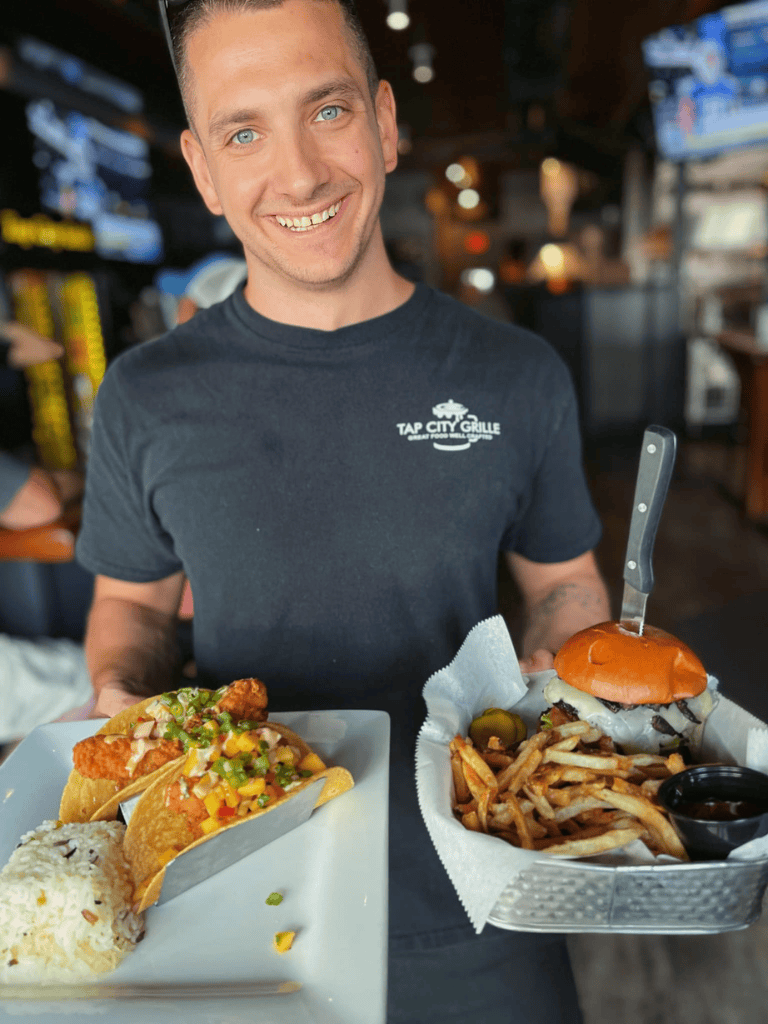 Delicious American cuisine featuring burgers, fries, and tacos at local restaurant.